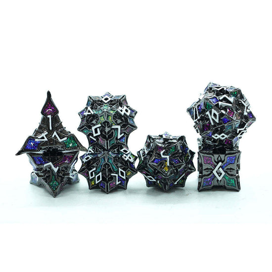 Jeweled Keep seven-piece dark metal dice set with multicolored sparkling details, view 1