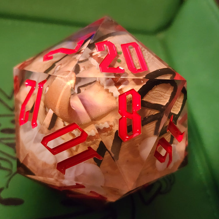 Mimic D20 with red numbering and a toothy treasure chest visible inside