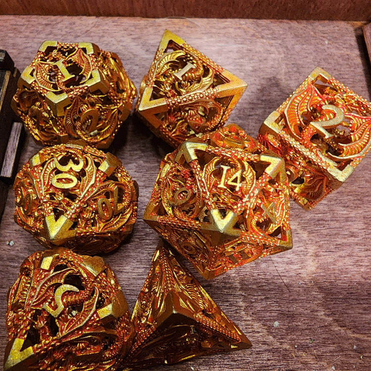 Gold and red seven-piece hollow metal dragon dice set