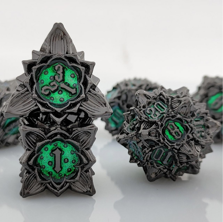 Lotus Flower seven-piece metal dice set in Dark Emerald