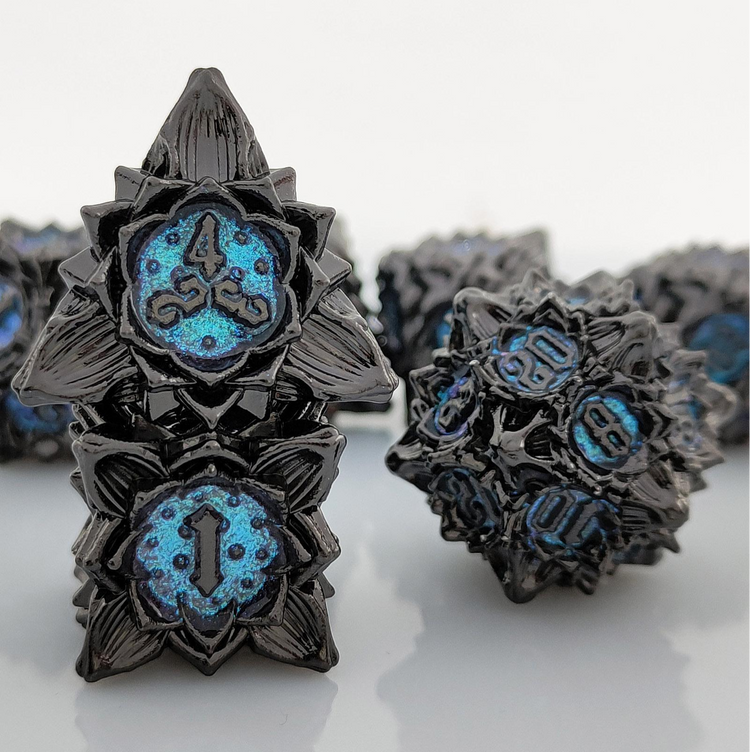 Lotus Flower seven-piece metal dice set in Dark ice