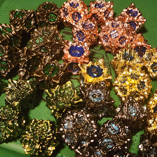 Lotus Flower seven-piece metal dice sets in five finishes