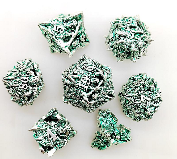 Silver and green seven-piece spiky metal dragon dice set