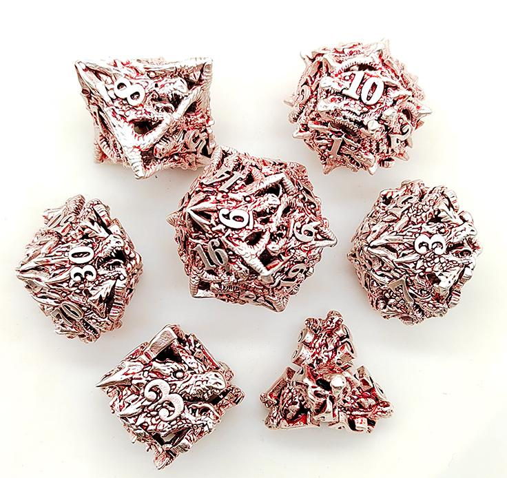 Silver and red seven-piece spiky metal dragon dice set