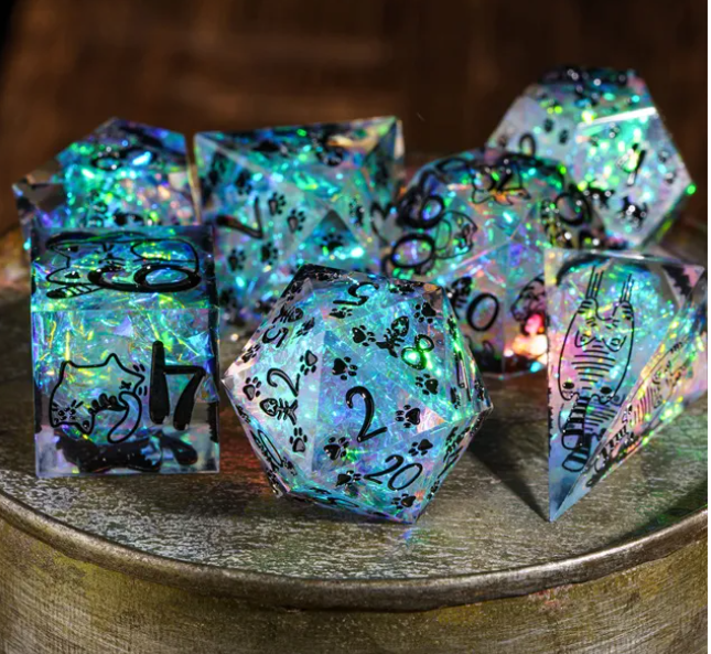 Clear iridescent seven-piece sharp resin cat dice set with black numbers