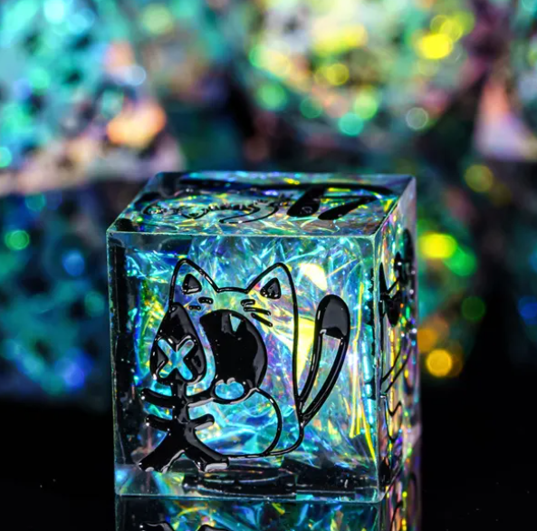 Close-up of cat and fish illustration on iridescent D6