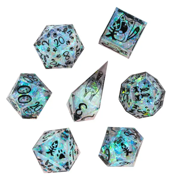 Seven iridescent cat dice with pawprint and fishbone designs