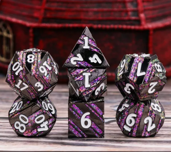 Amethyst Hall black and purple striped seven-piece metal dice set