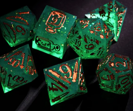Green dice showing bows arrows blades and wilderness motifs